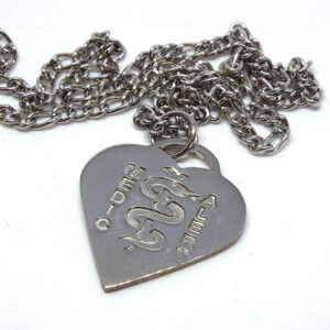 Heart-shaped stainless steel disc with MedicAlert logo, to hang on neck chain
